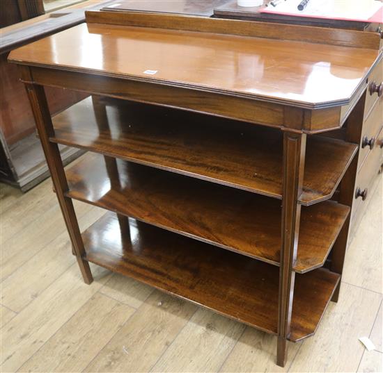 A Regency style walnut four tier buffet, W.102cm